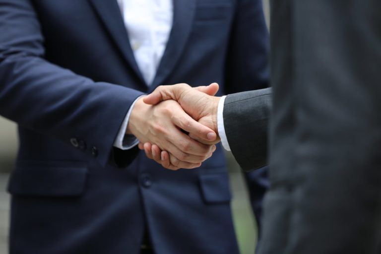 handshake to close a verbal contract